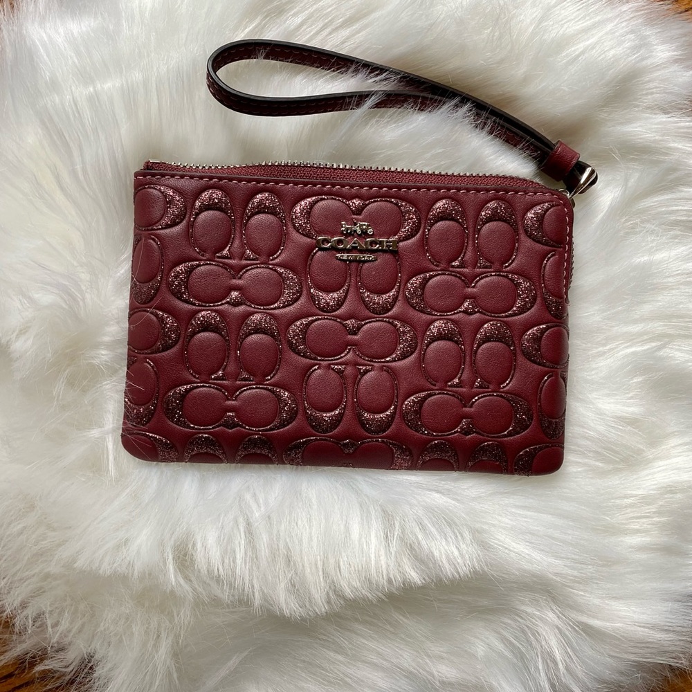 NWOT Coach mini wristlet, purple w/ glitter detail